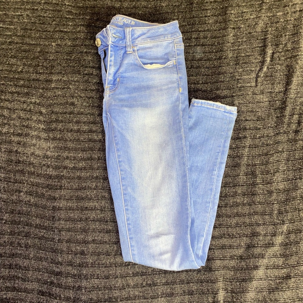 Mid-wash low rise Jegging jeans